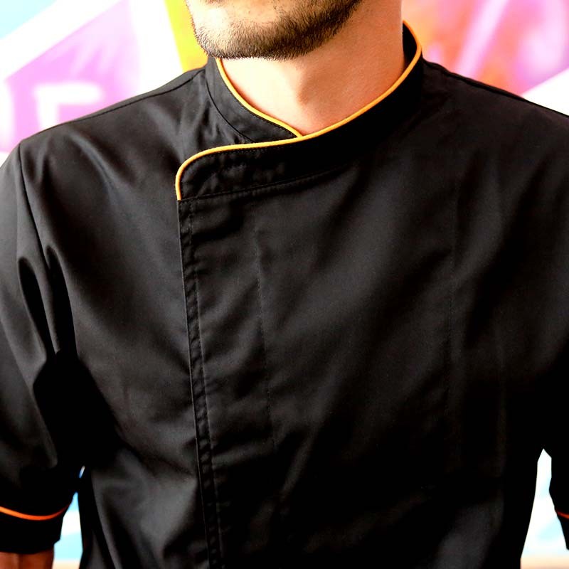Veste de Cuisine Noire Liseré Orange  Boutons pressions invisibles