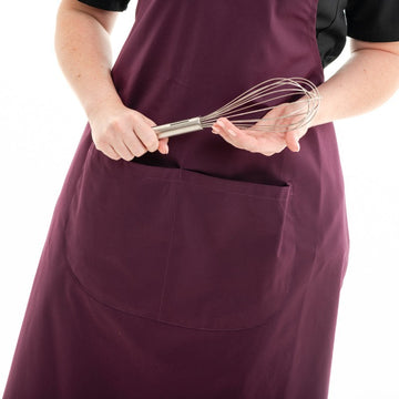 Zoom sur les poches du tablier prune Manelli