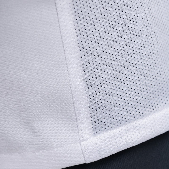 Détail de la maille respirante de la veste de cuisine manches courtes ABAX blanc