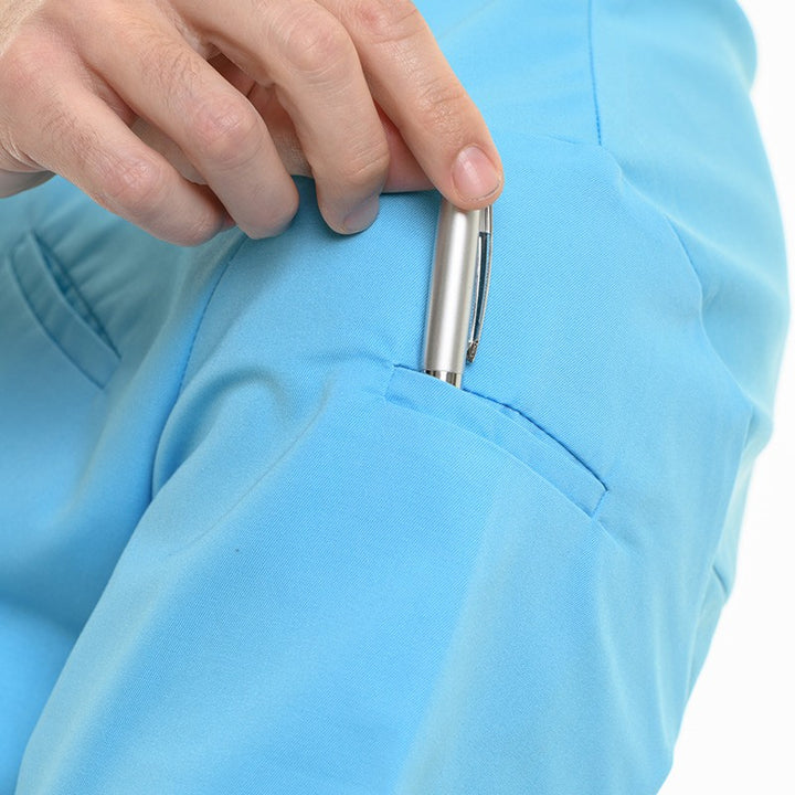 Veste de cuisine Texas Manelli bleu turquoise détail poche stylo