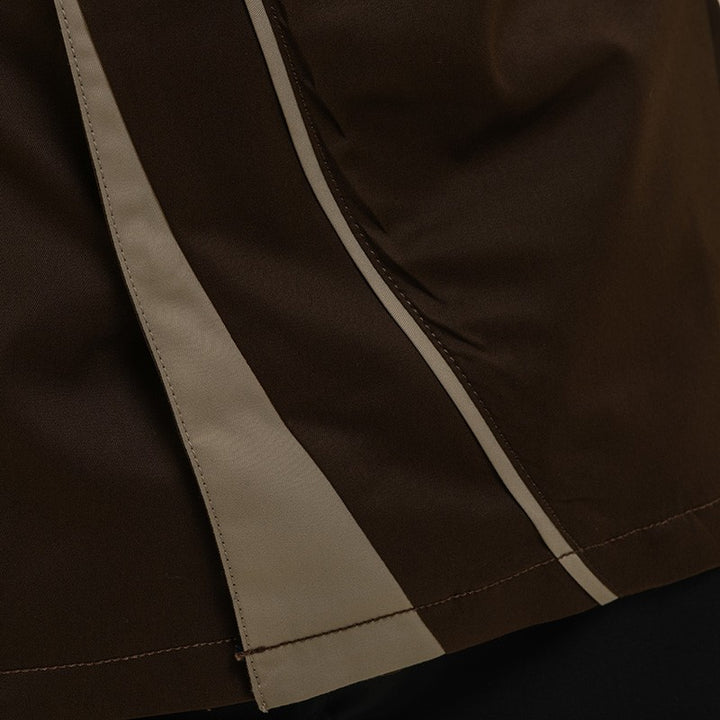 Détail asymétrie veste de cuisine Mint Marron