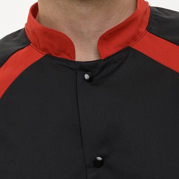 Détail veste de pâtisserie noire duo rouge Manelli