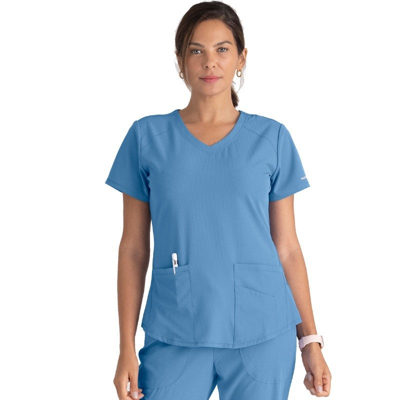 Skechers Tunique médicale bleue ciel col V matière recyclée