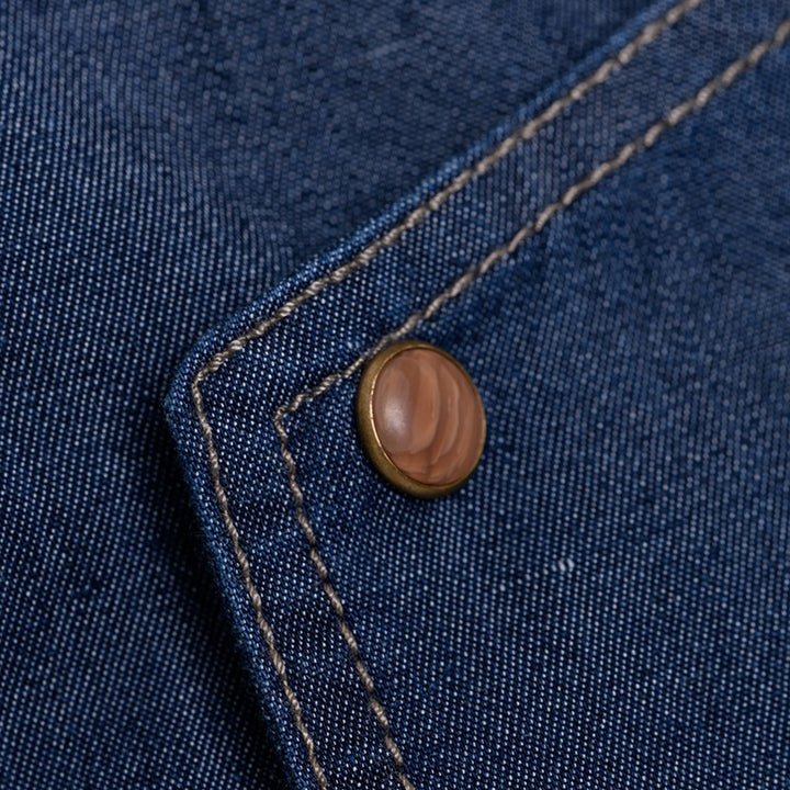 Détail de la veste de cuisine détail jean denim