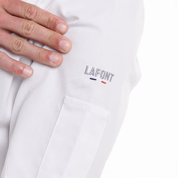 Détail de la broderie de la veste de cuisine Mint blanche liseré noir marque Robur