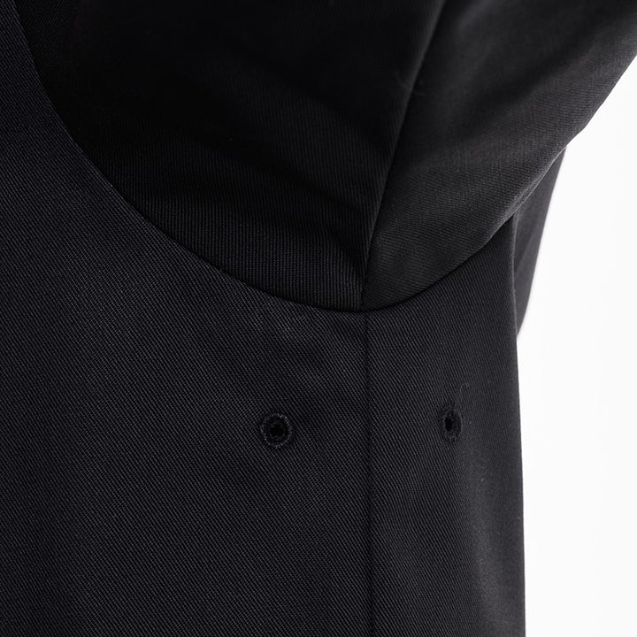 Détail des oeillets d'aération sur la veste de cuisine homme de la marque Manelli - gamme Dual coloris noir bleu