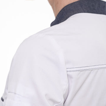 Détail surpiqûre sur modèle Elbax veste de cuisine femme Robur