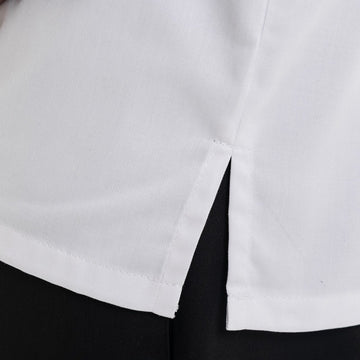 Détail de la fente de la veste de cuisine homme