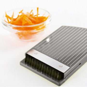 Mandoline réglable avec bac de récupération transparent de 1,2 litre